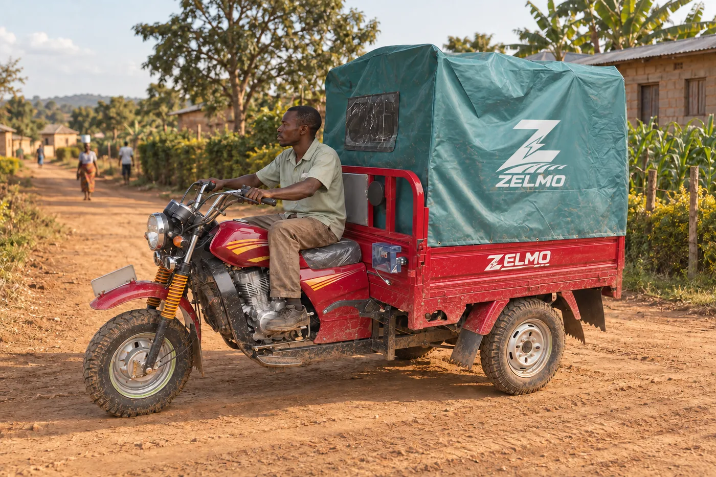 ZELMO covered cargo body red front three-quarter view · Village roads