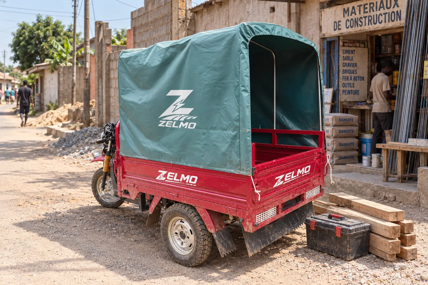 ZELMO covered cargo body red rear three-quarter view · Neighbourhood supplies