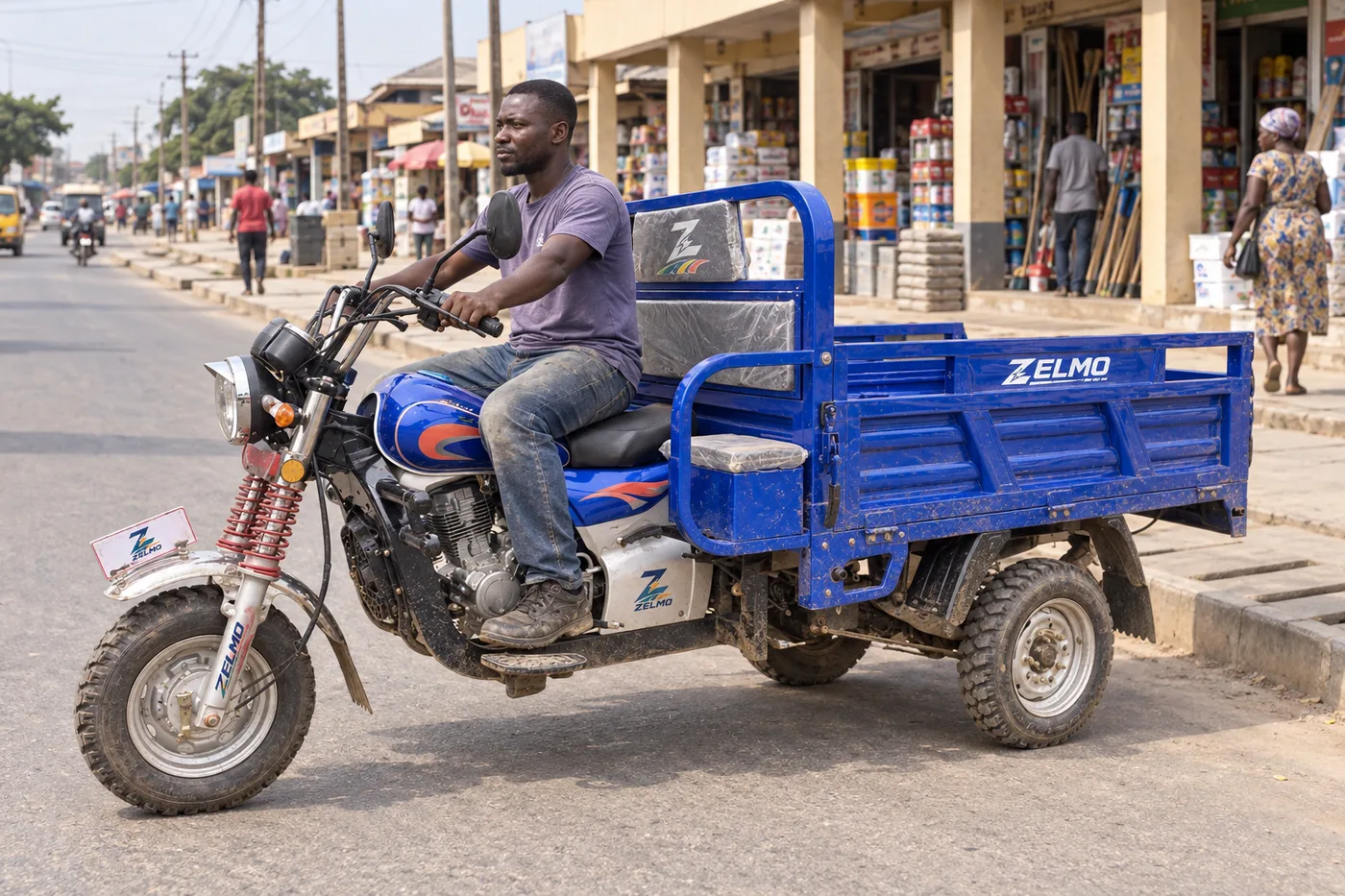 ZELMO open cargo body blue front three-quarter view · City streets