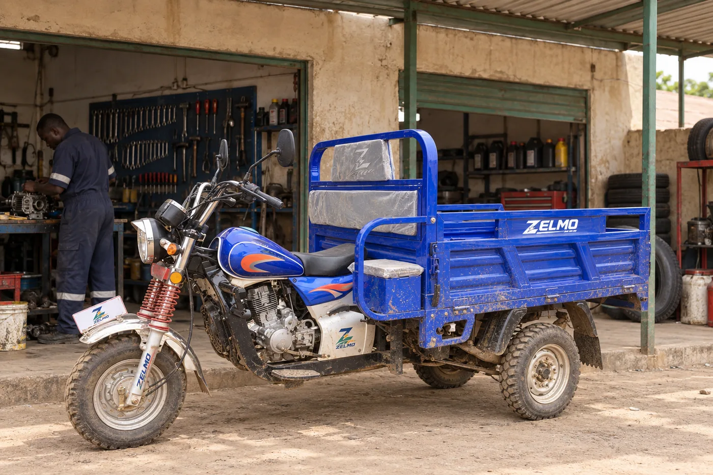 ZELMO open cargo body blue front three-quarter view · The local workshop