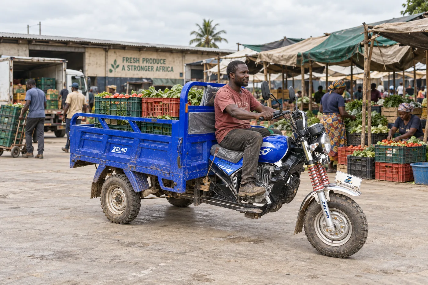 ZELMO open cargo body blue front three-quarter view · Cargo vehicle at a produce market