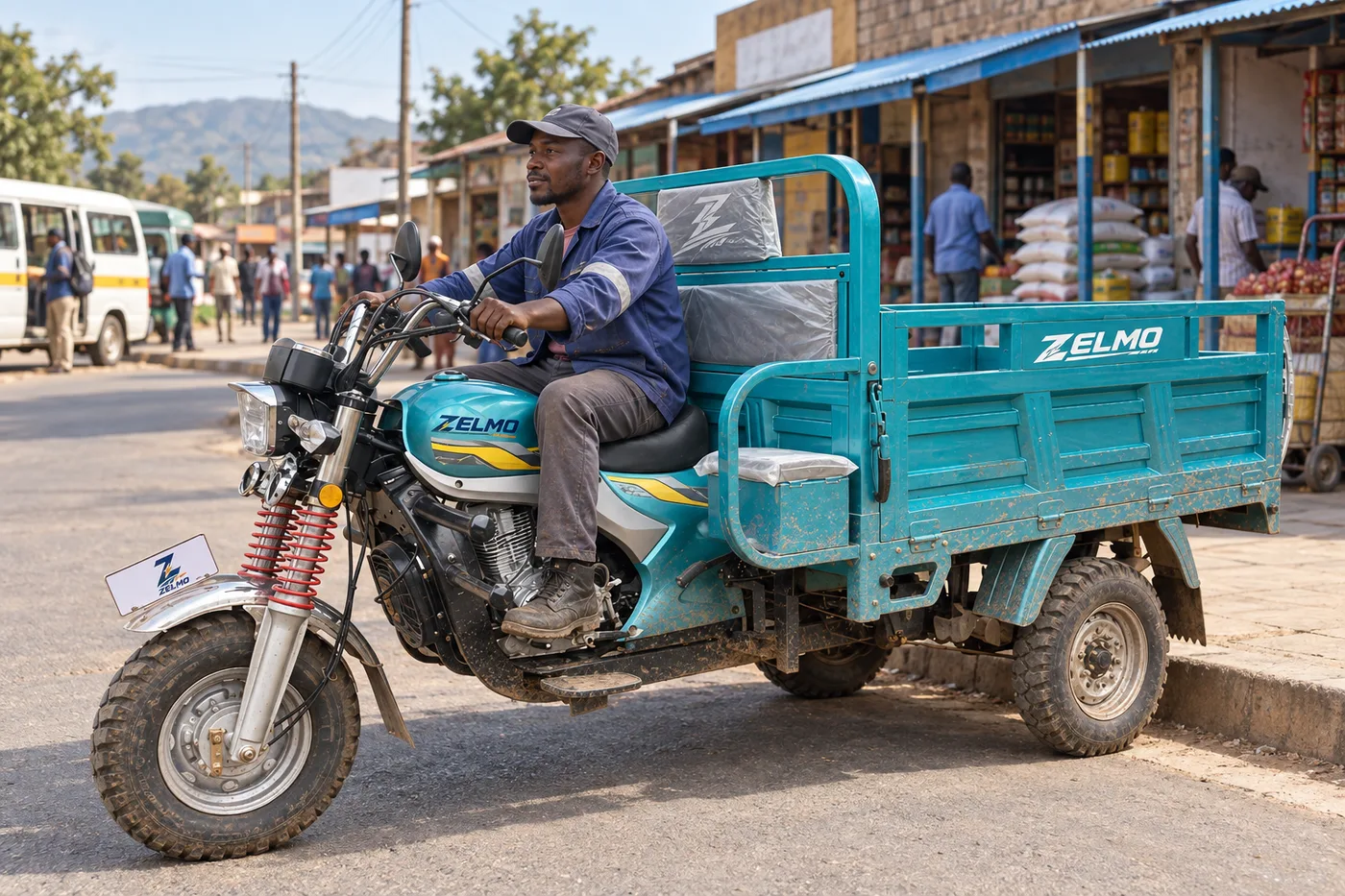ZELMO open cargo body teal front three-quarter view · City streets