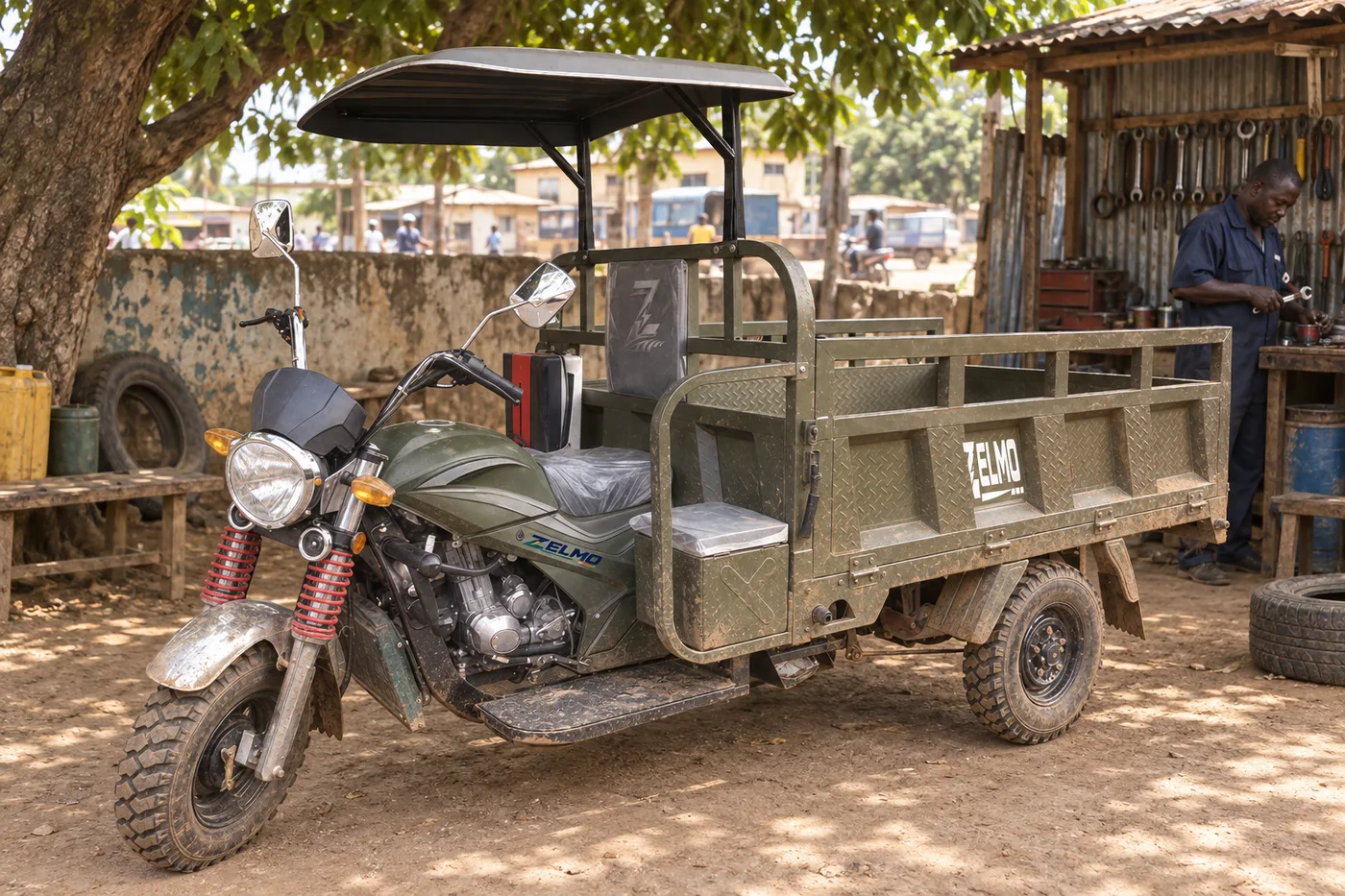 ZELMO utility body olive front three-quarter view · Vehicle display and workshop setting